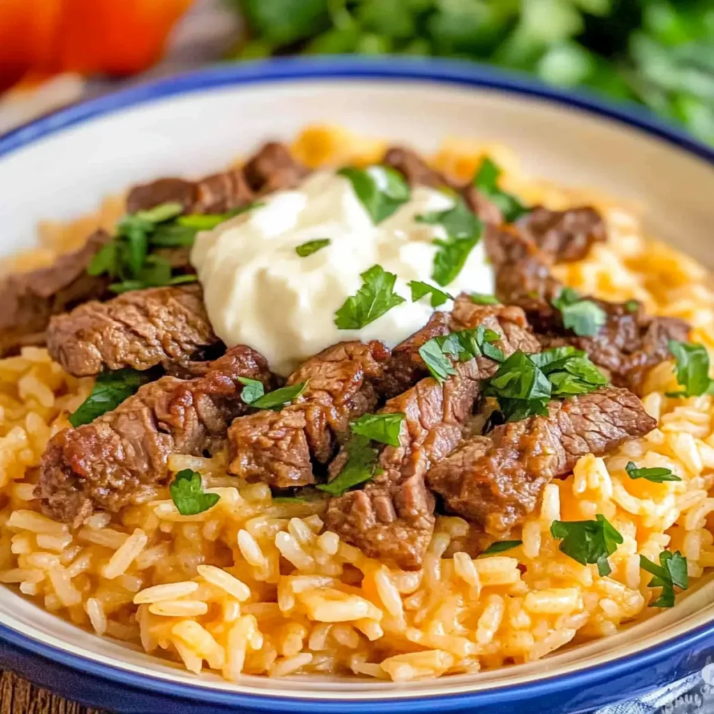 Queso Rice with Steak Strips